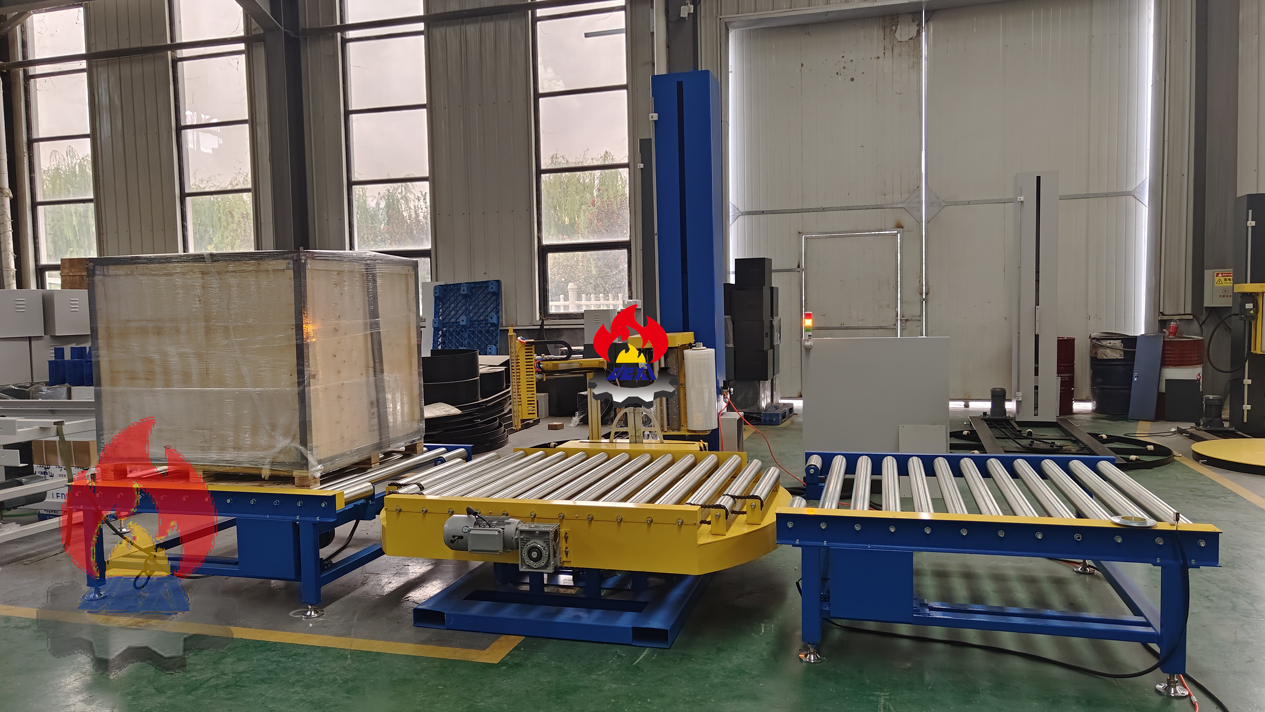 Deliver Palletizer Robot and Wrapping Machine to Europe
