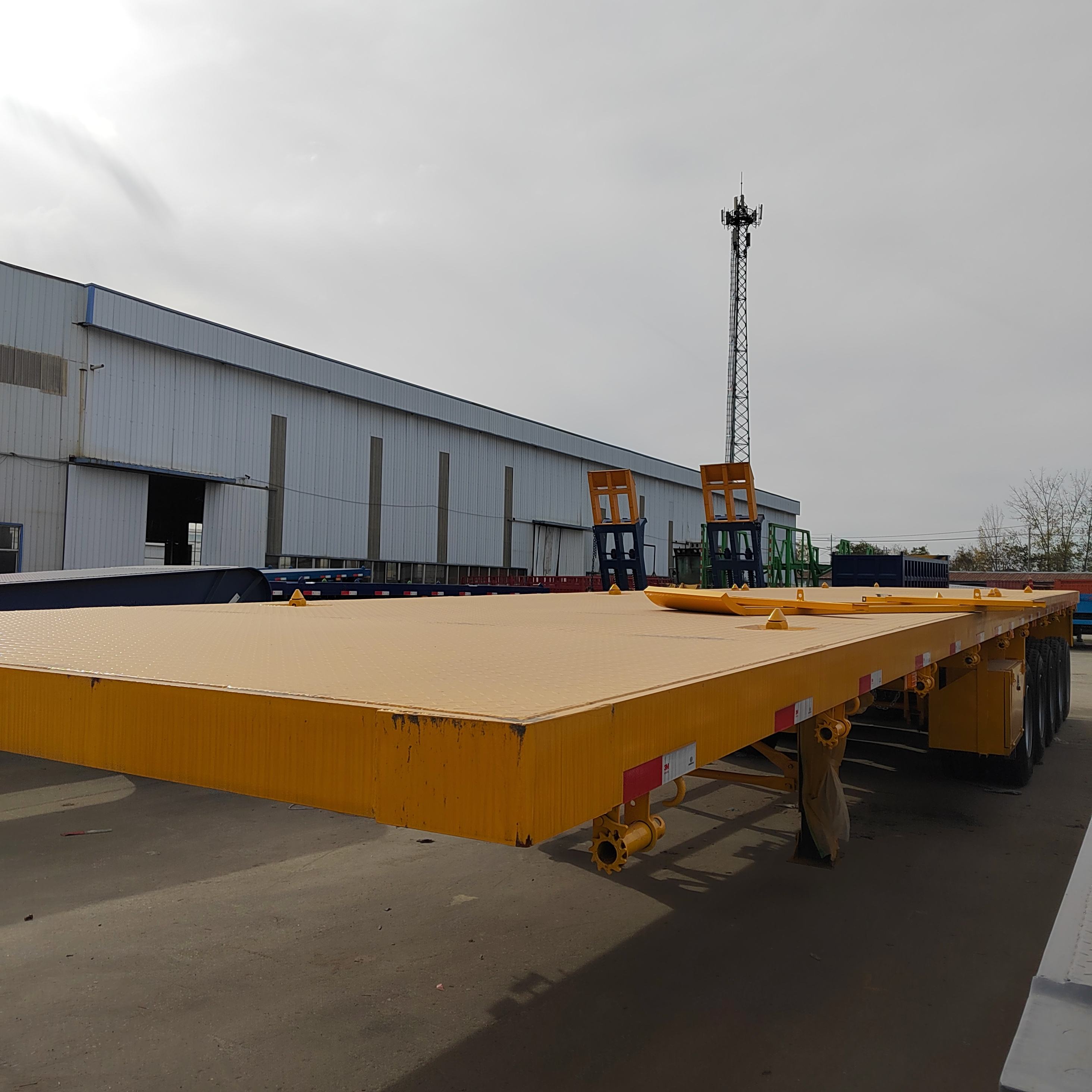 5 Axle Flatbed Semi Trailer 40FT 45FT 60T Container Flatbed Truck Trailers Cargo Transport Steel Flatbed Tow Truck