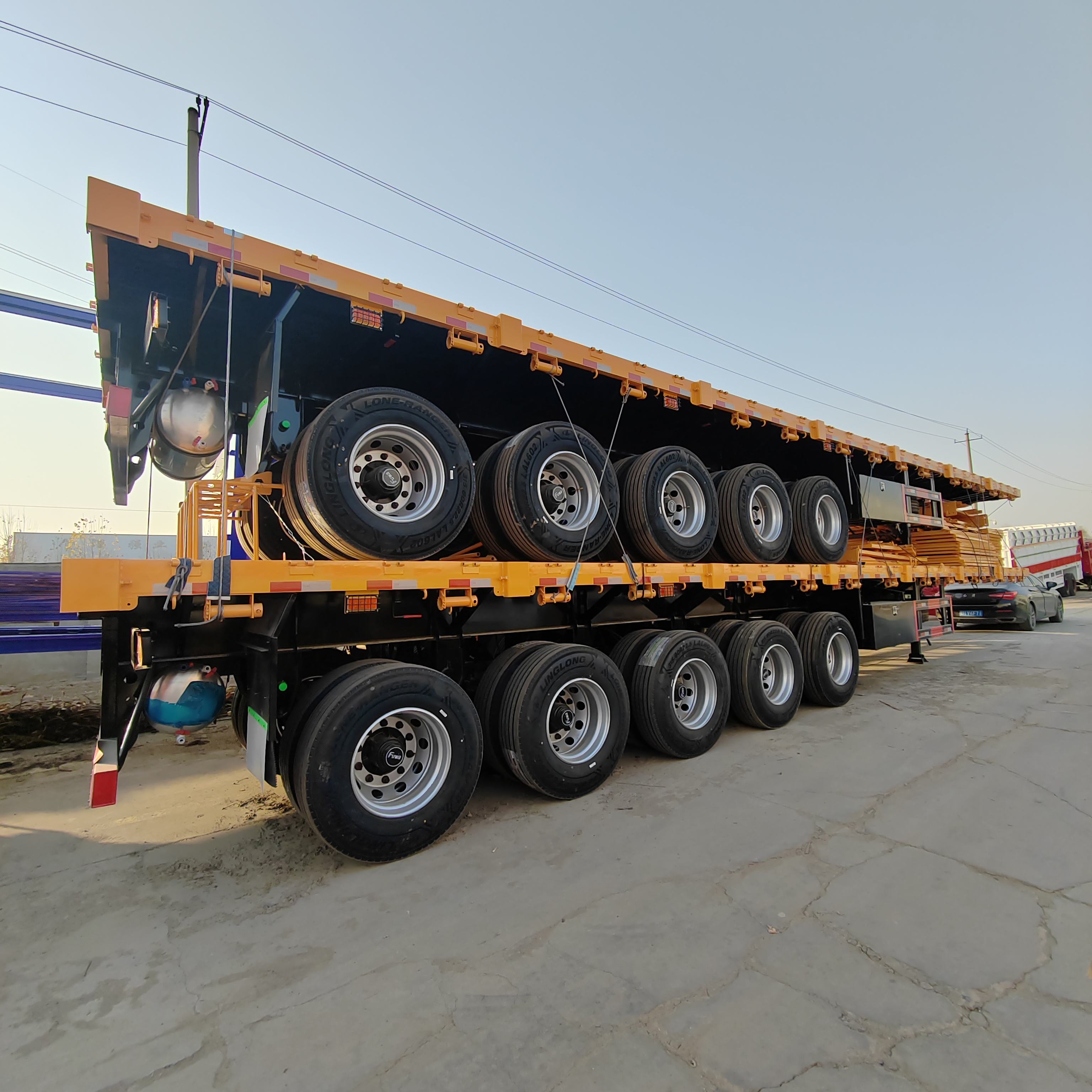 5 Axle Flatbed Semi Trailer 40FT 45FT 60T Container Flatbed Truck Trailers Cargo Transport Steel Flatbed Tow Truck
