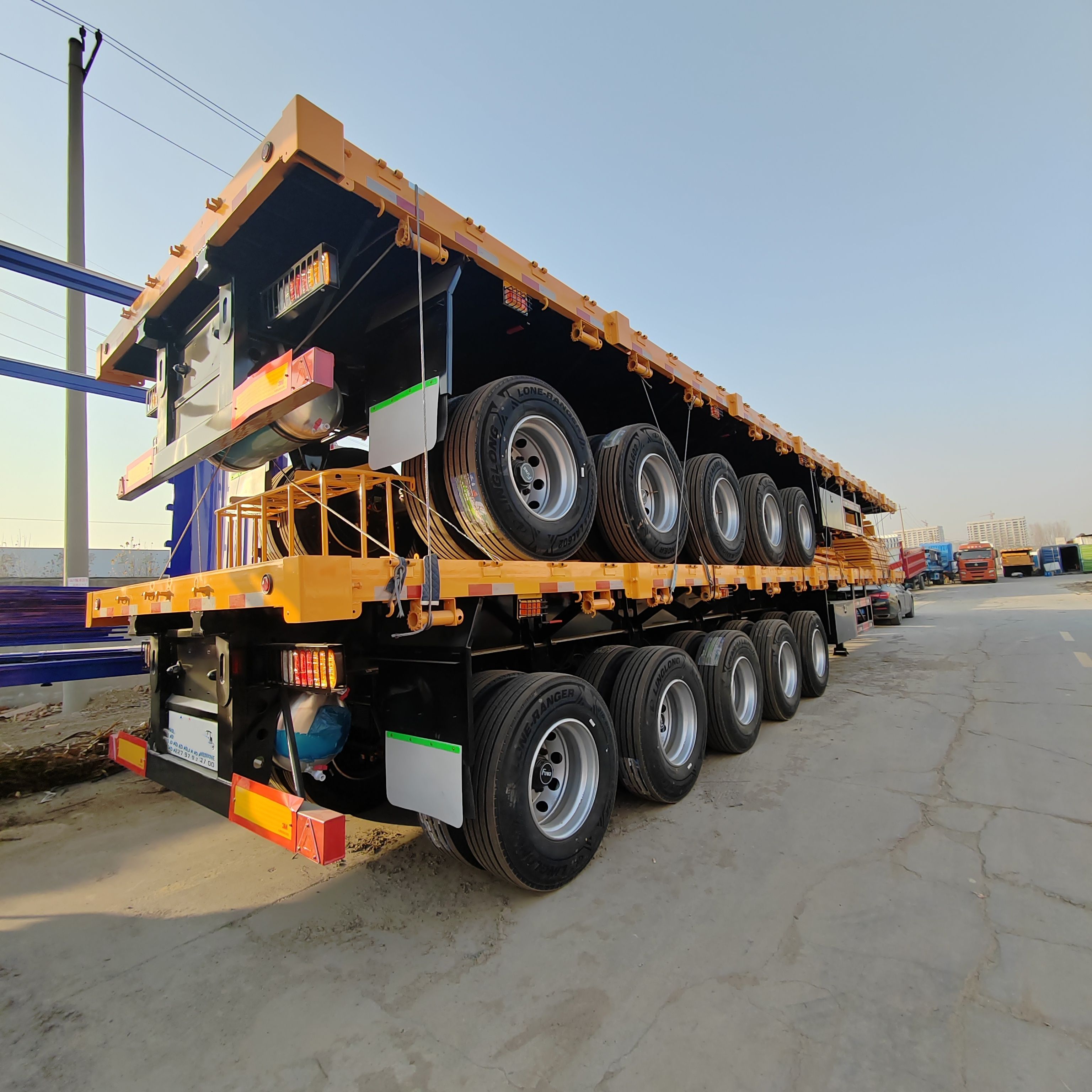 5 Axle Flatbed Semi Trailer 40FT 45FT 60T Container Flatbed Truck Trailers Cargo Transport Steel Flatbed Tow Truck