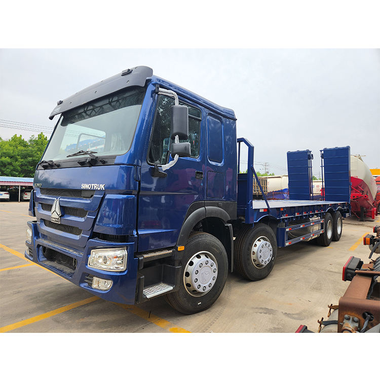 flatbed truck Howo 8x4  for heavy machinery transport