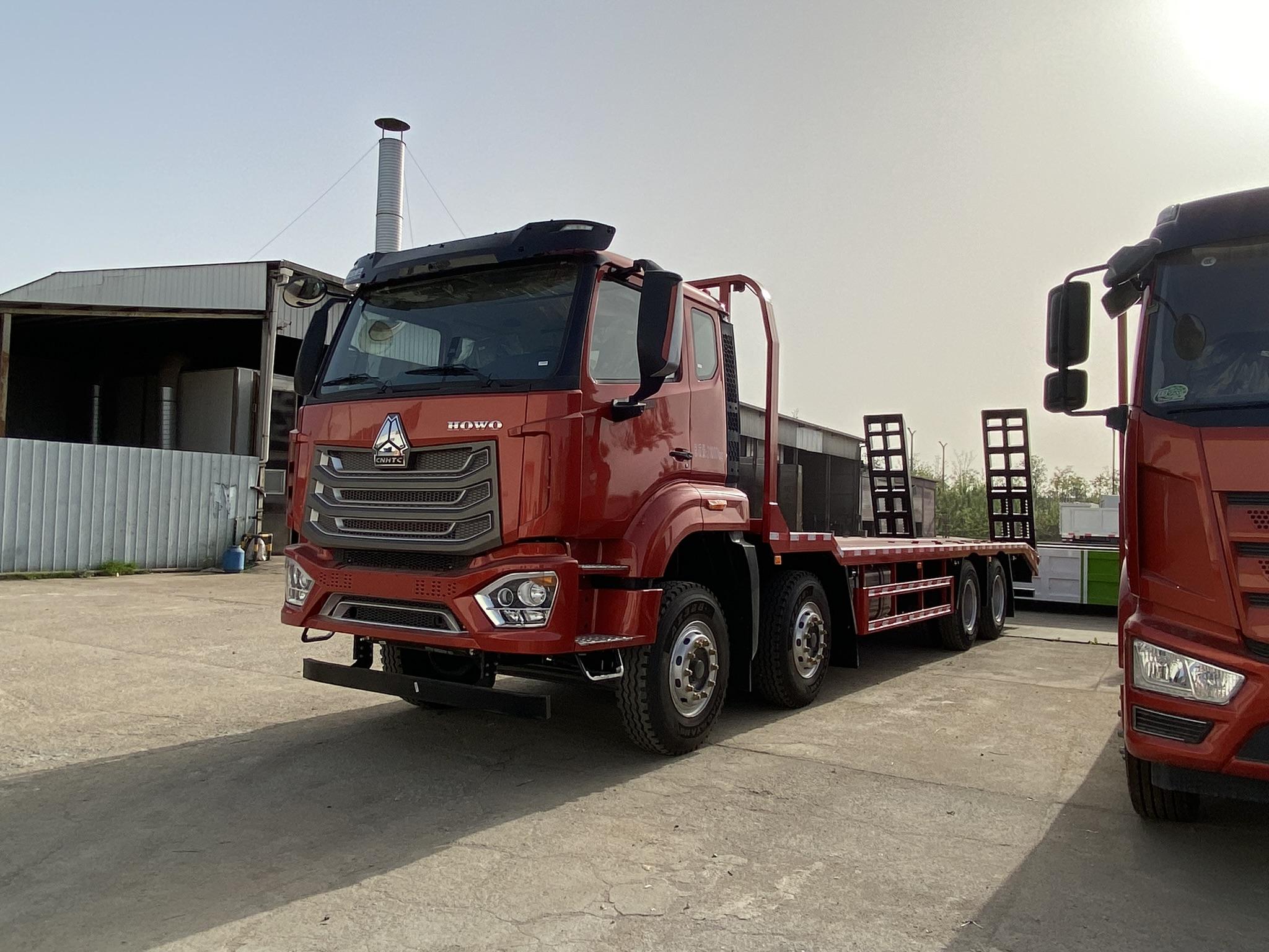 flatbed truck Howo 8x4  for heavy machinery transport