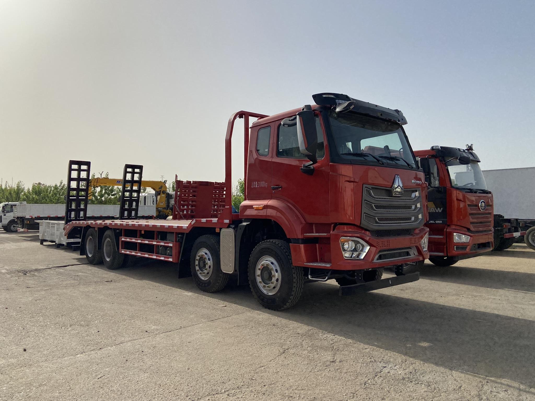 flatbed truck Howo 8x4  for heavy machinery transport