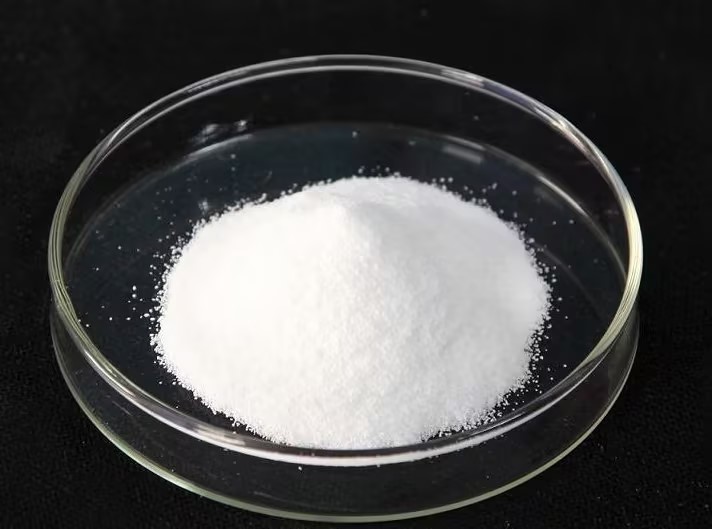 What are the functions and applications of sodium molybdate?