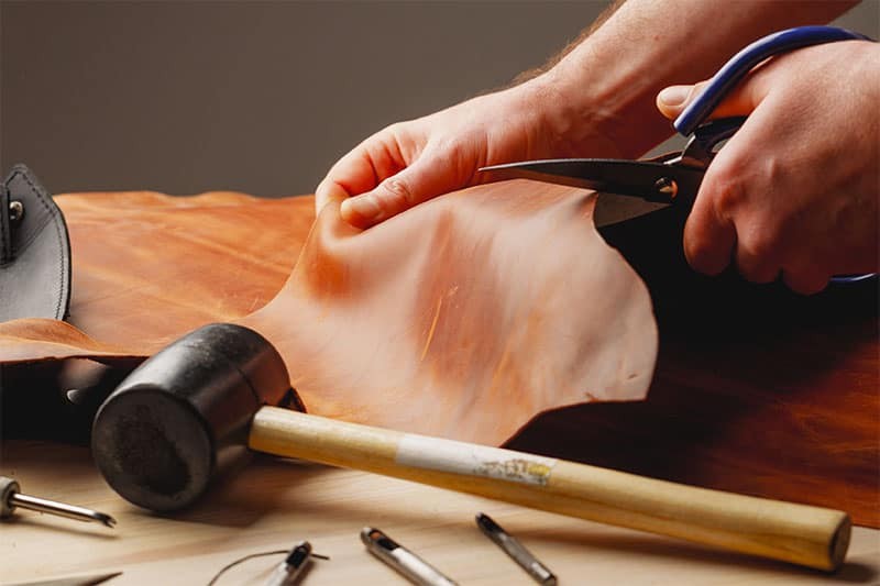 woman manufacturing leather goods handmade handbag woman manufacturing leather goods handmade handbag