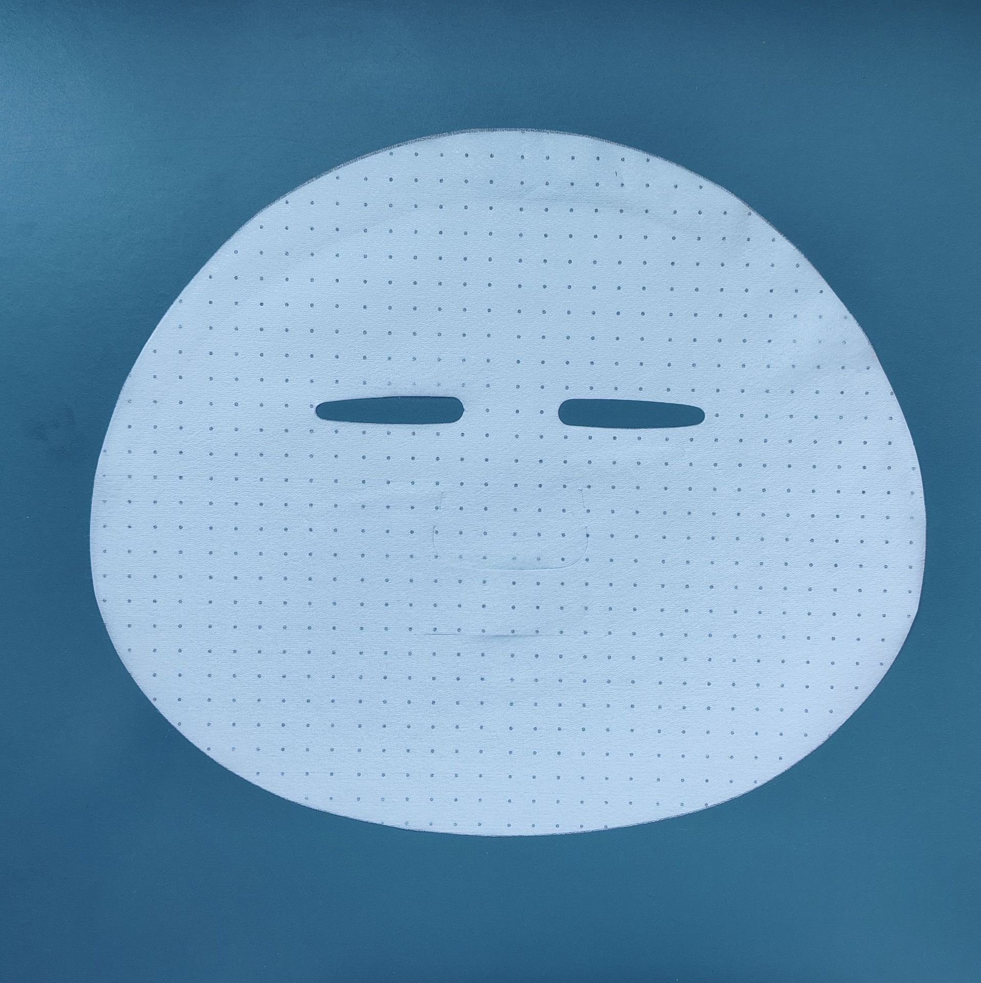 Cuprammonium rayon and natural fiber blend facial mask base fabric