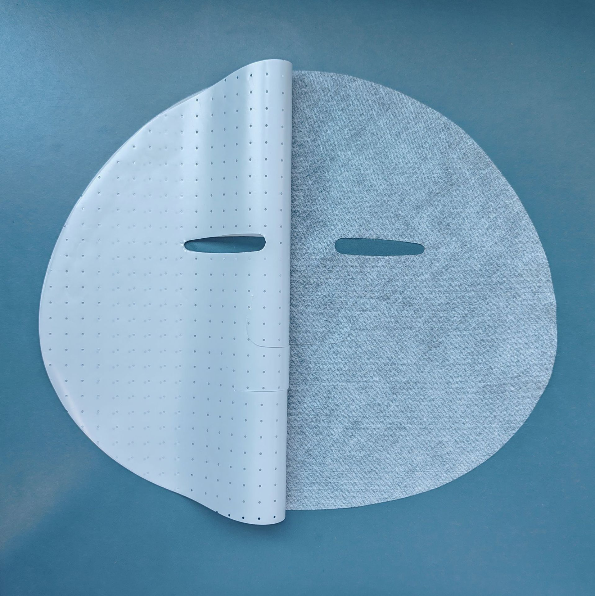 Cuprammonium rayon and natural fiber blend facial mask base fabric