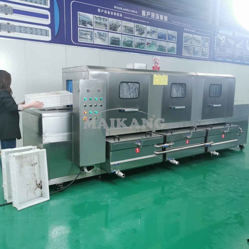 Machine à laver les caisses