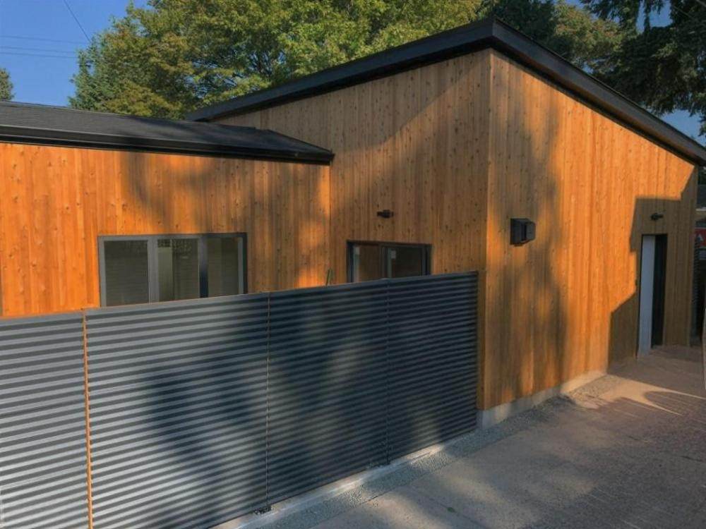 Are aluminum privacy fence panels compatible with existing steel post systems — and what retrofitting standards apply?