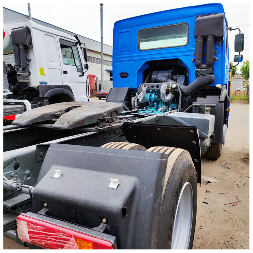 HOWO 336HP 4x2 tractor truck rear three quarter view with fifth wheel