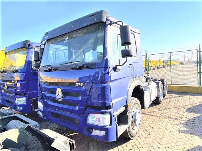 HOWO T7H 430HP 6x4 Tractor Truck front 3/4 view highlighting modern cab and heavy-duty chassis