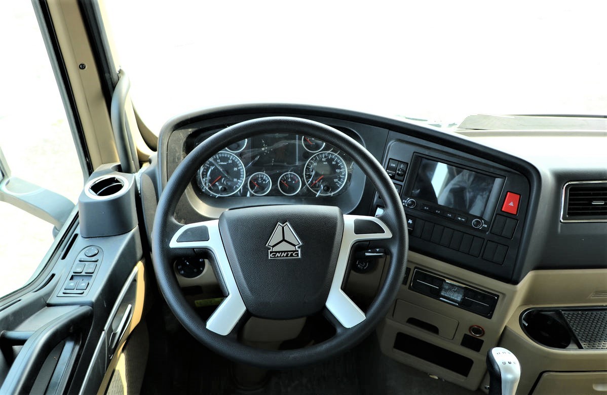 HOWO T5G 270HP 6x4 cargo truck steering wheel detail showing ergonomic design