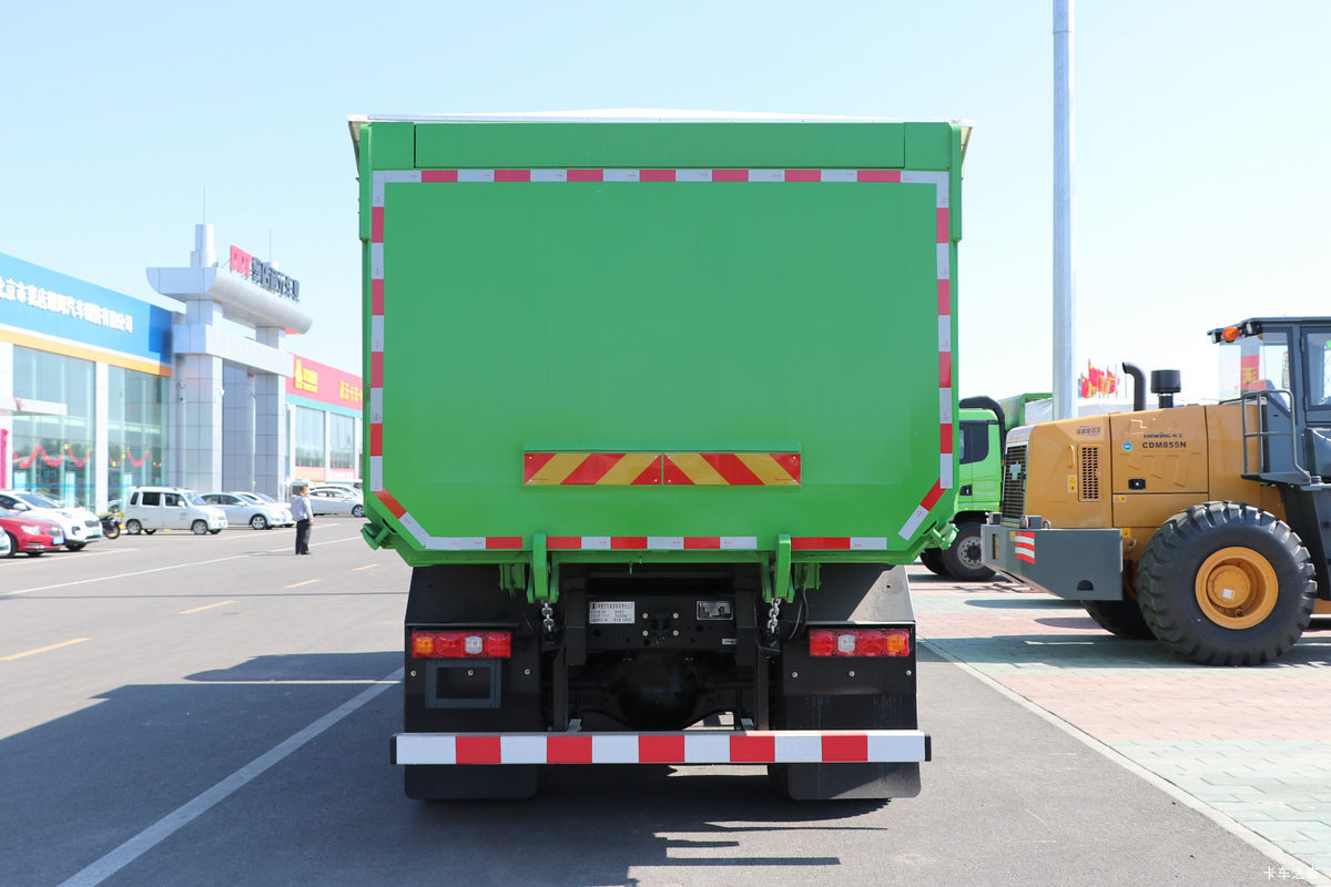 Shacman X3000 6x4 heavy duty dump truck rear view showing tipping system and reinforced chassis