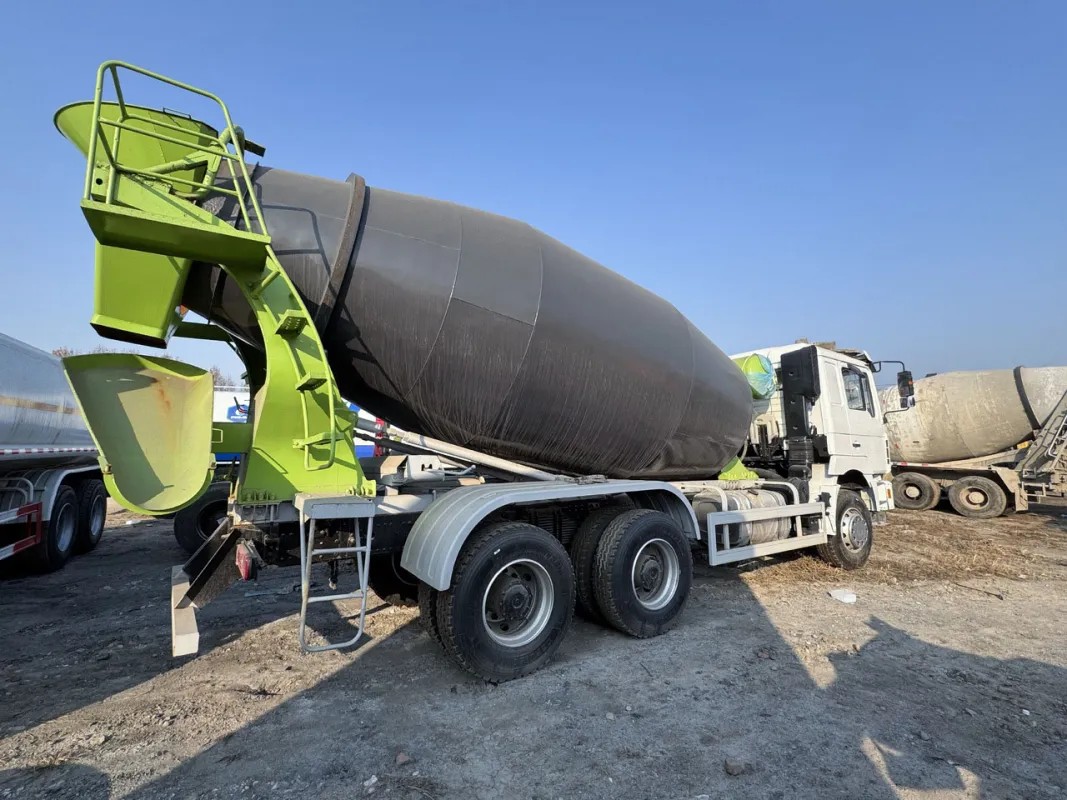Shacman F3000 6x4 heavy duty concrete mixer truck rear three quarter view showing discharge chute and rear frame