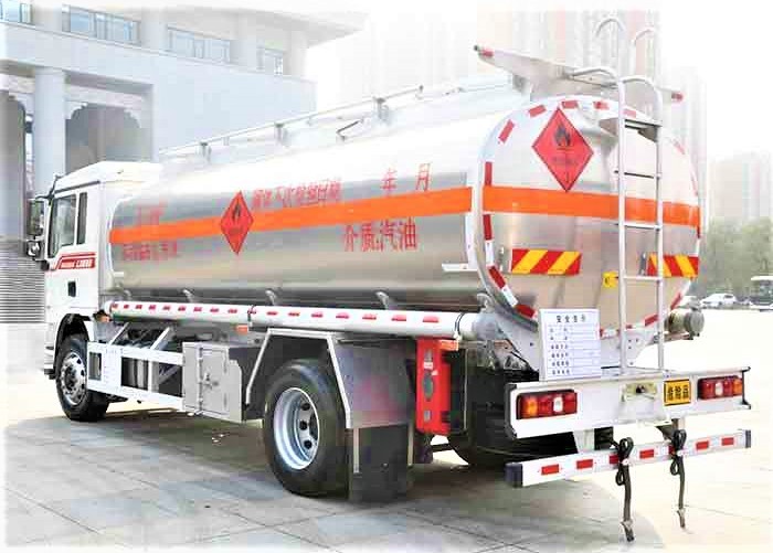 Shacman L3000 4x2 heavy duty fuel tanker truck rear three quarter view showing discharge valve and rear chassis