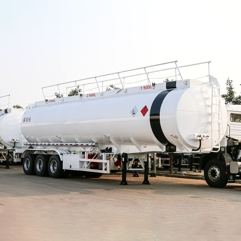 3 axle carbon steel fuel tanker trailer front three quarter view highlighting tank body and axle layout
