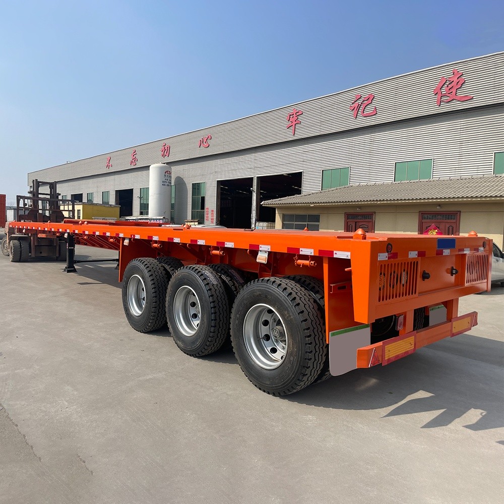 3 axle 40ft flatbed container semi trailer rear three quarter view showing rear structure and lighting system
