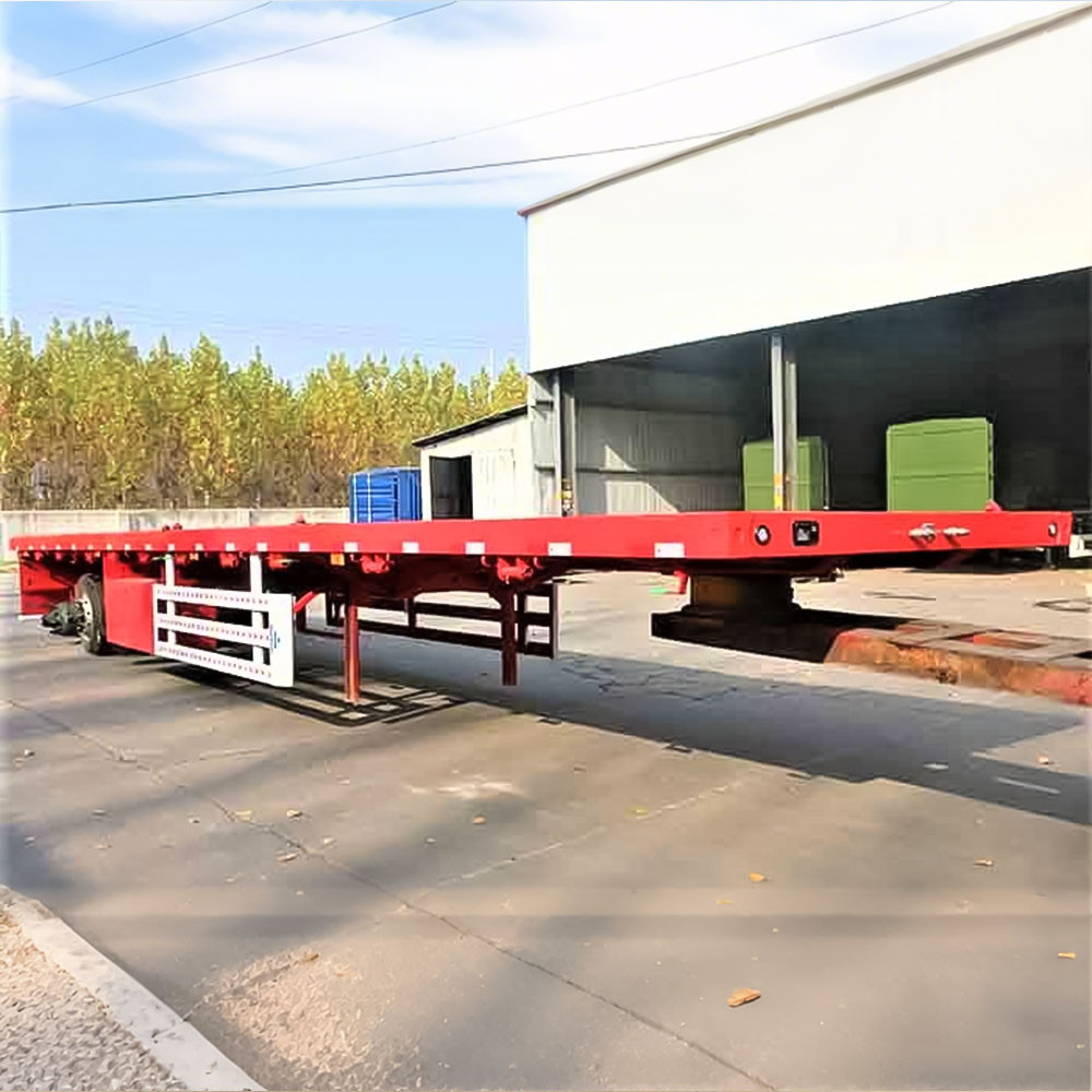 3 axle flatbed semi truck trailer side view showing long flat deck for container and steel transport
