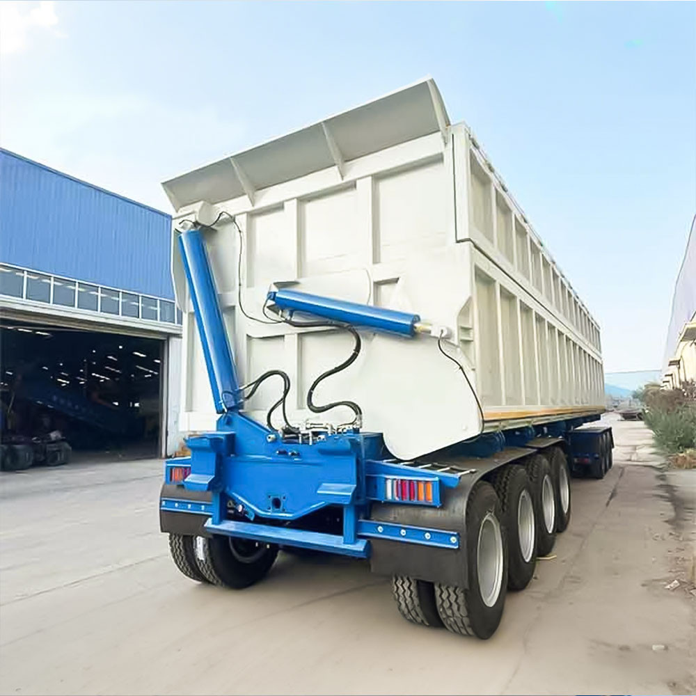4 axle side dump drawbar trailer rear three quarter view showing discharge tailgate and heavy duty frame