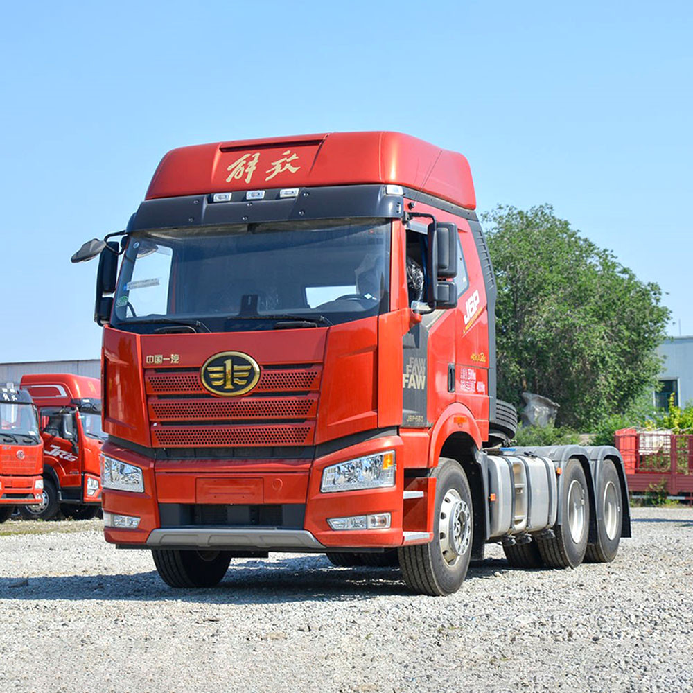 FAW J6P 560HP 6×4 tractor truck front three quarter view highlighting grille, headlights and cabin design