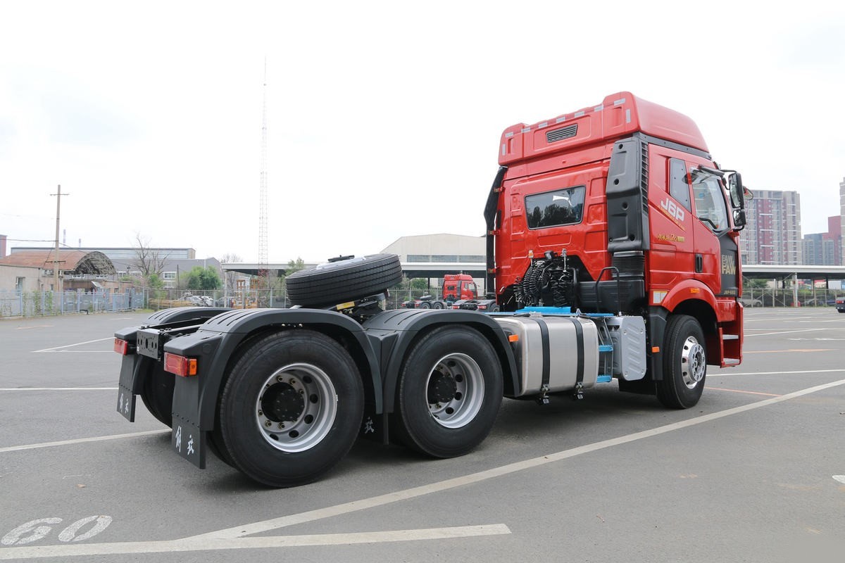 FAW J6P 550HP 6×4 tractor truck rear three quarter view showing chassis and fifth wheel coupling
