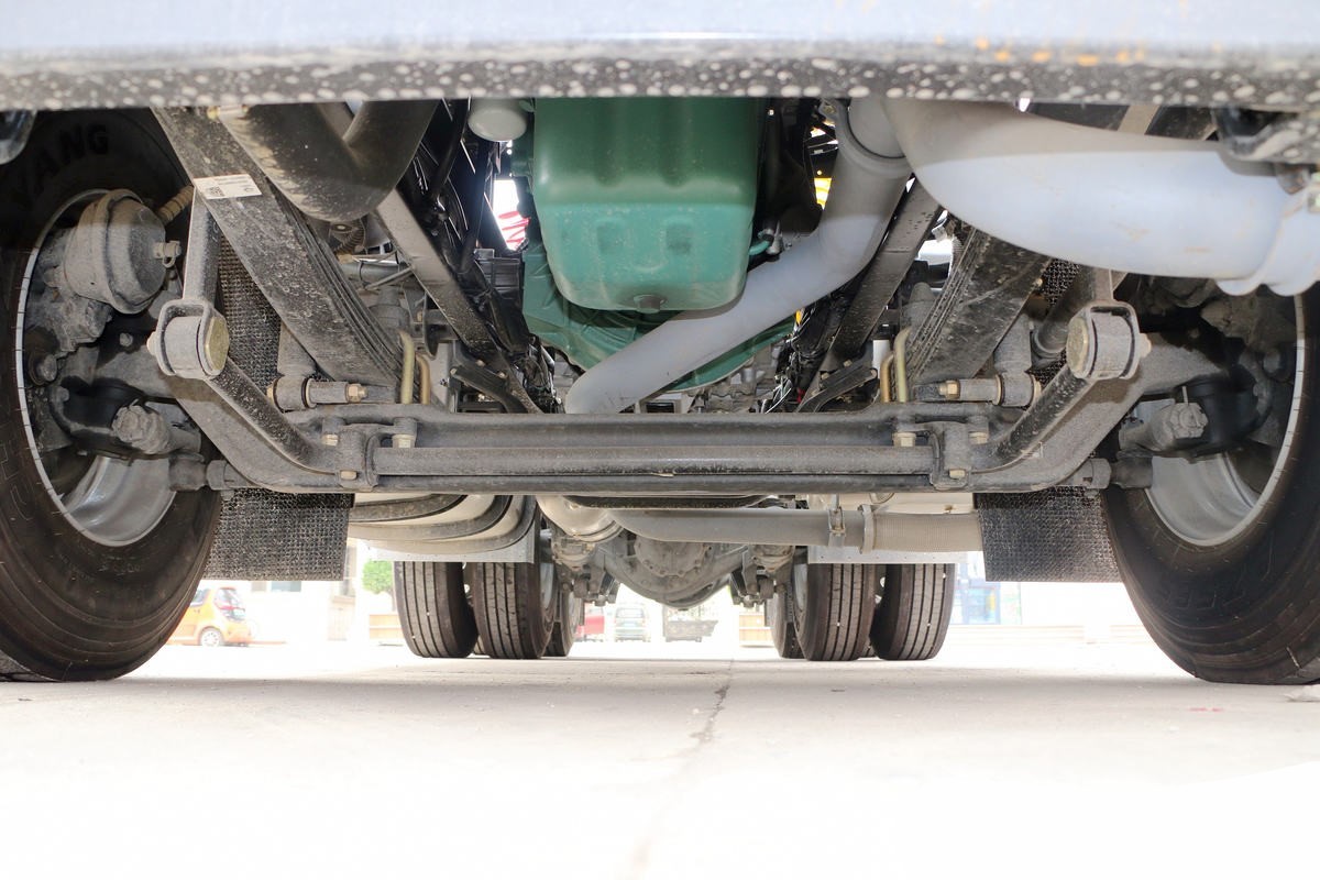 FAW J6P 6×4 tractor truck chassis detail showing heavy duty frame, suspension system and axle layout