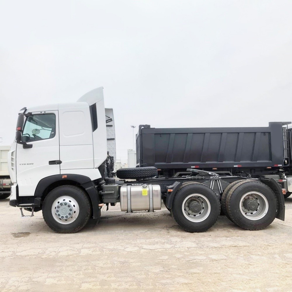 HOWO T7H 430HP 6x4 Tractor Truck side view showing long wheelbase and fuel tank layout