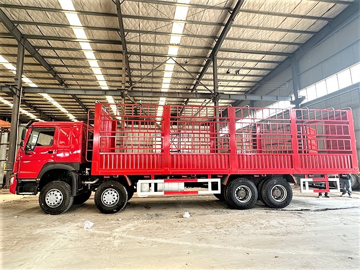 HOWO 380HP 8x4 cargo truck side view showing long wheelbase and cargo body