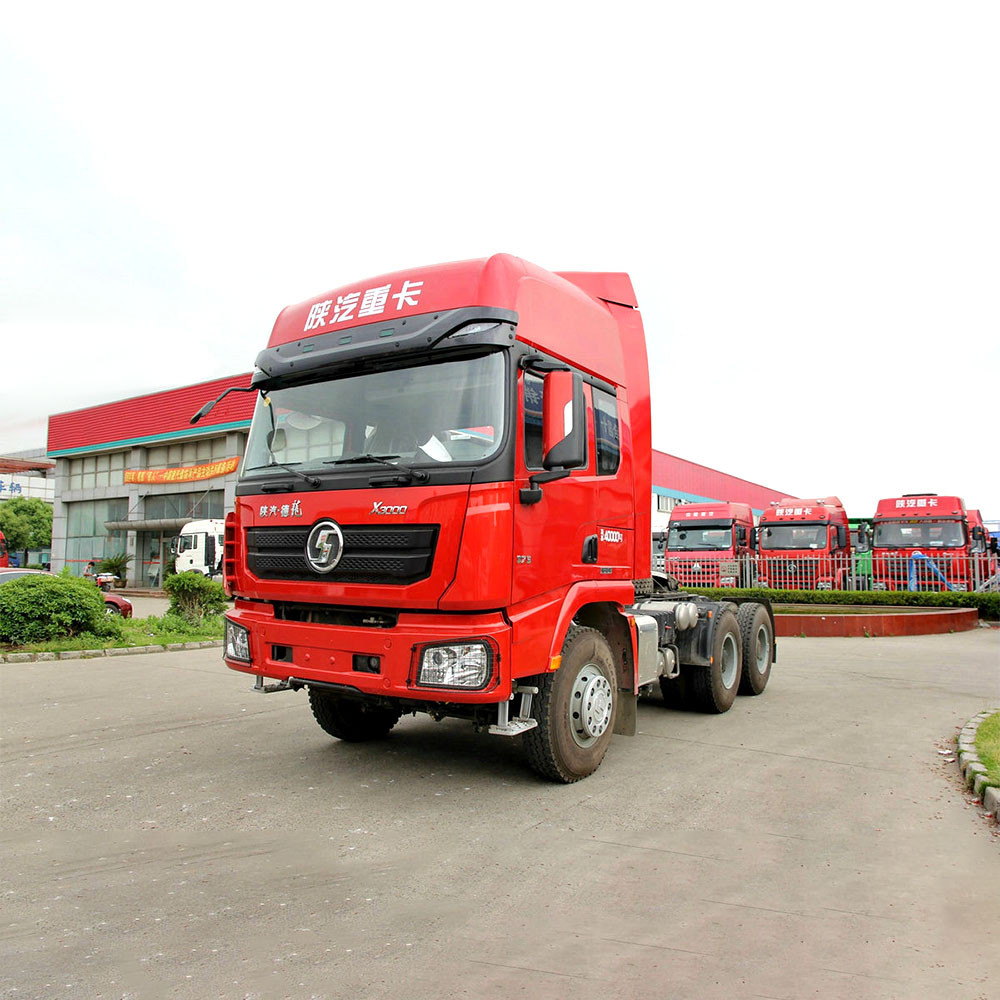 Shacman X3000 6x4 heavy duty tractor truck front three quarter view highlighting aerodynamic cab design