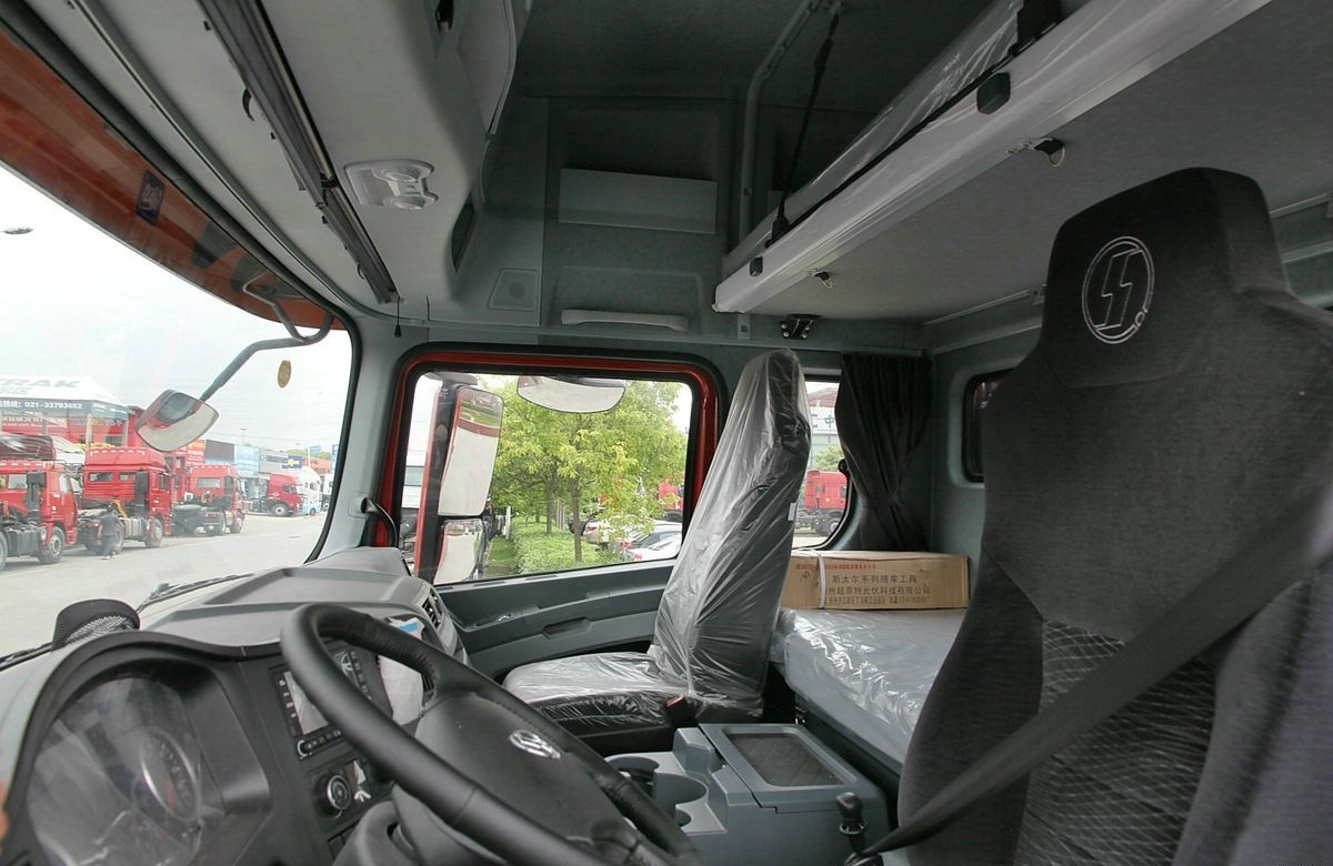 Shacman X3000 6x4 heavy duty tractor truck cabin interior showing ergonomic layout and driver comfort