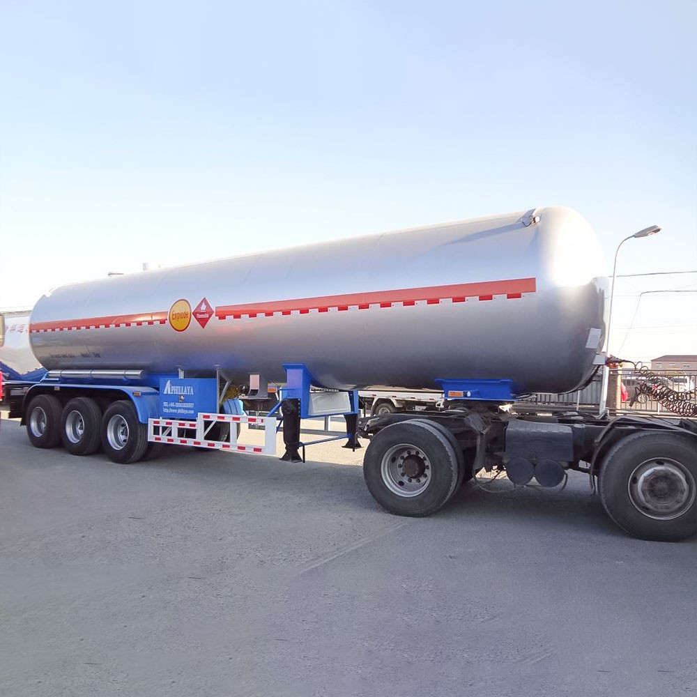 Propylene LPG tanker truck trailer front three quarter view highlighting tank body and axle layout