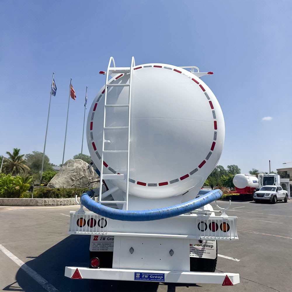 3 axle 85CBM bulk cement semi trailer rear view showing piping system and safety valves