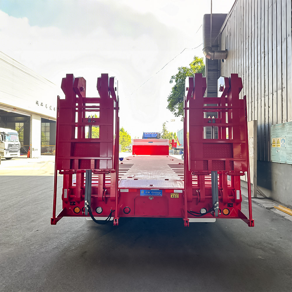 9 axle lowbed semi trailer rear view showing reinforced ramps for excavator and machinery loading