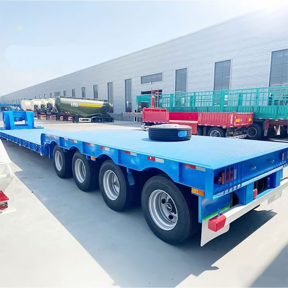 4 axle 80 ton RGN low bed trailer rear three quarter view showing heavy-duty loading ramps and rear frame