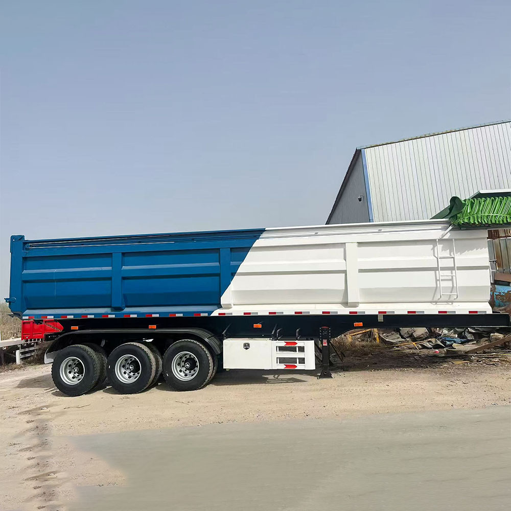 3 axle 30CBM U dump trailer side view showing large capacity body and tipping mechanism
