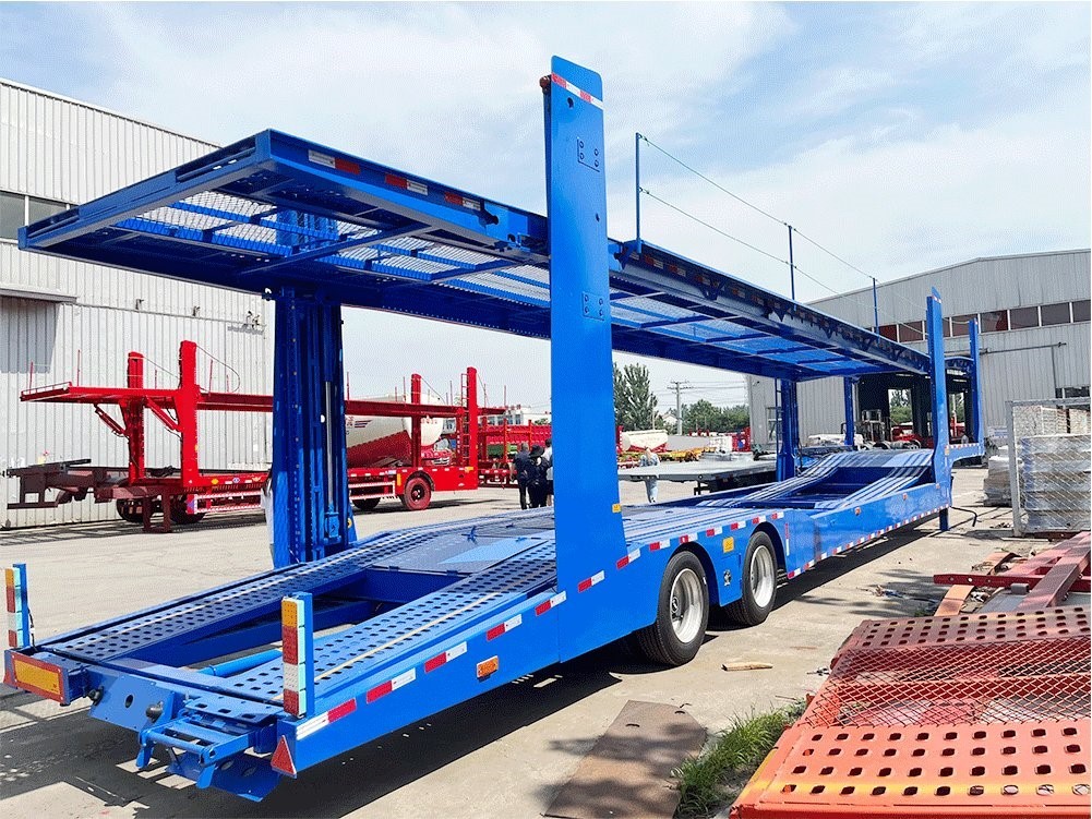 double deck 8-car carrier semi trailer front three quarter view highlighting double deck structure and long chassis