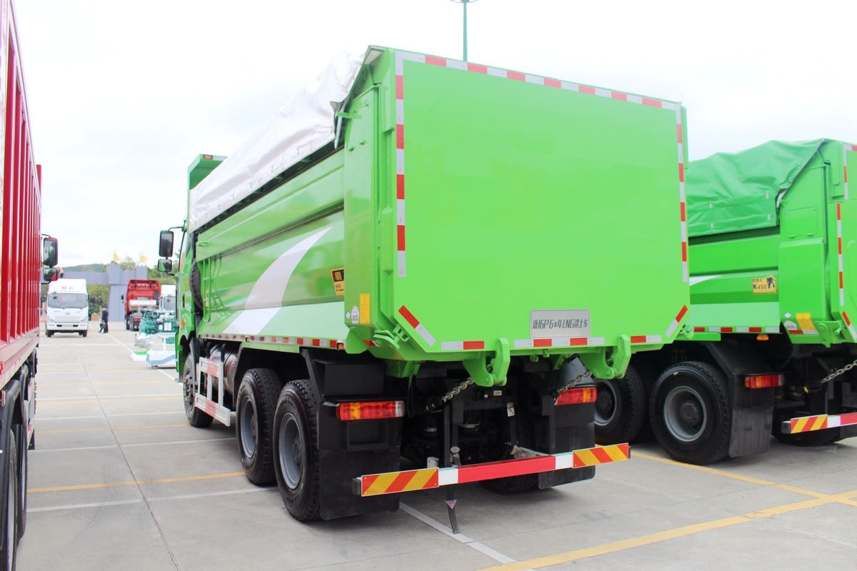 FAW J6P 6×4 dump truck rear three quarter view showing tailgate and hydraulic lifting system