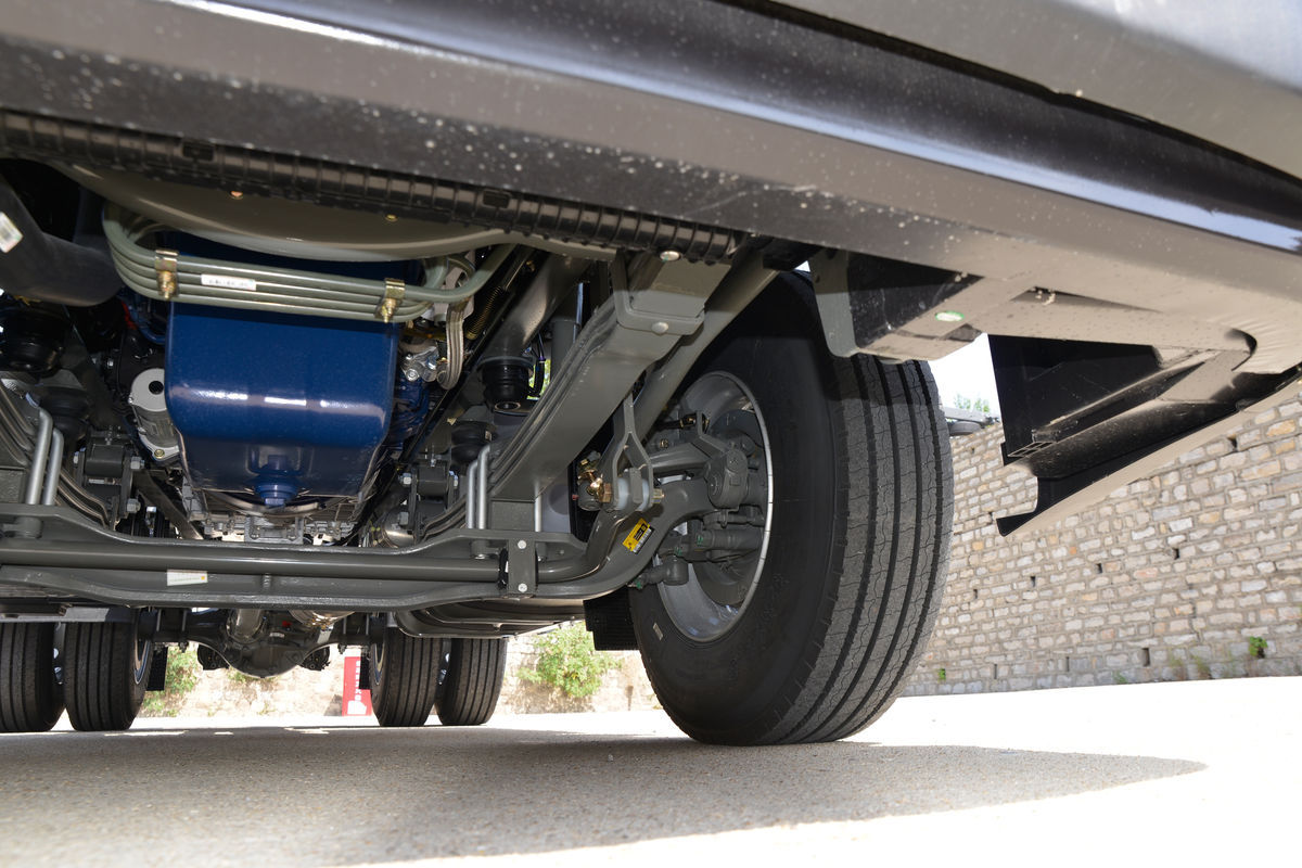 HOWO TX 400HP 4x2 tractor truck chassis showing reinforced frame and axles for heavy-duty transport