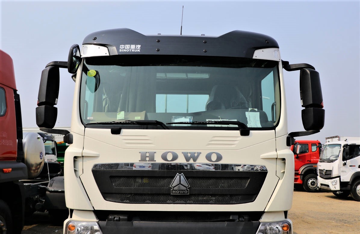 HOWO T5G 270HP 6x4 cargo truck front view showing T5G cab and heavy duty chassis