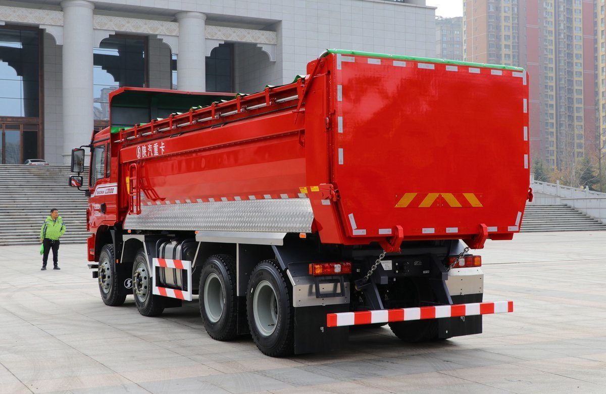 Shacman L3000 8x4 350HP dump truck rear three quarter view showing dump body tilt and rear frame