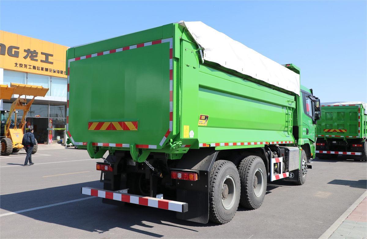 Shacman X3000 6x4 heavy duty dump truck rear three quarter view showing dump body structure and rear frame