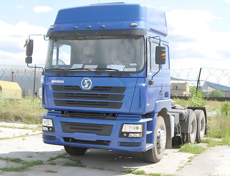 Shacman F3000 4x2 heavy duty tractor truck front three quarter view highlighting tractor head and chassis