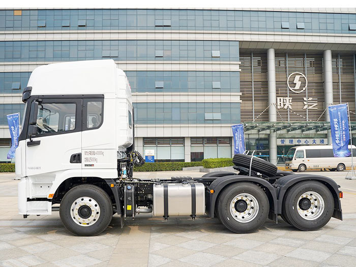 Shacman X5000 6x4 heavy duty tractor truck side view showing dual rear axle configuration