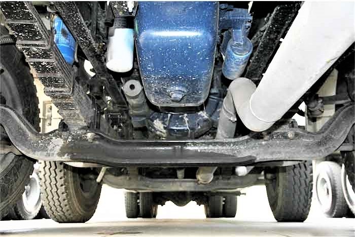 Shacman M3000 8x4 heavy duty fuel tanker truck chassis showing reinforced frame and suspension