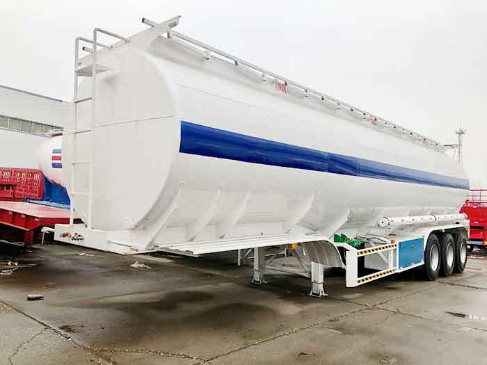 3 axle asphalt tanker semi trailer front three quarter view highlighting tanker shape and axle layout