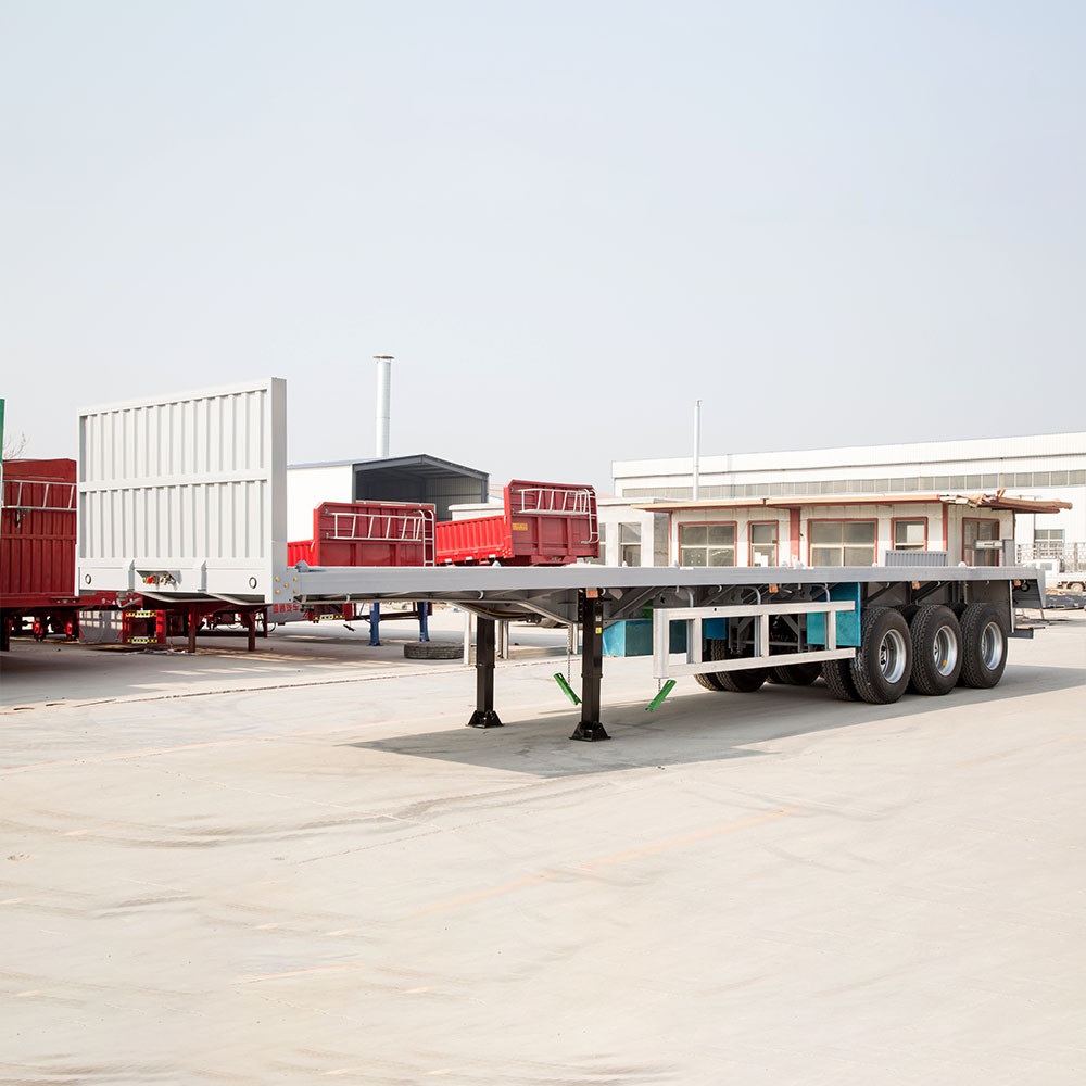 40ft flatbed semi trailer side view showing full length flat deck for container and steel transport
