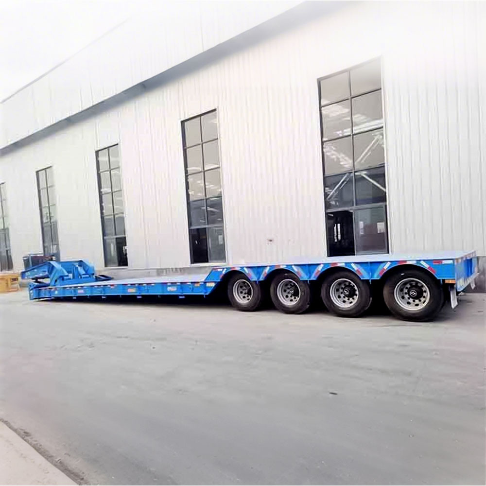 4 axle 80T RGN low bed trailer side view showing extended low deck for heavy equipment transport