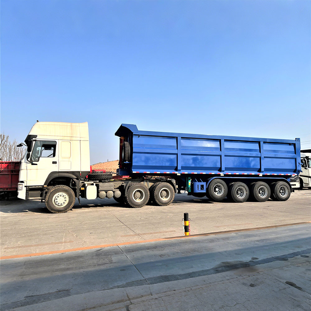 4 axle 40CBM end dump trailer side view showing large capacity body and tipping mechanism