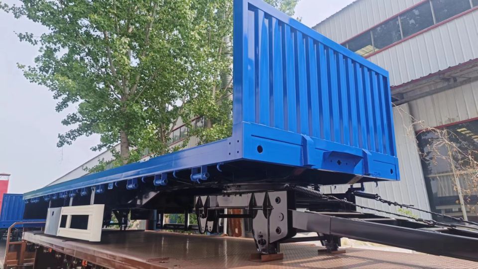 3 axle drawbar dump trailer front three quarter view highlighting drawbar connection and tri axle layout
