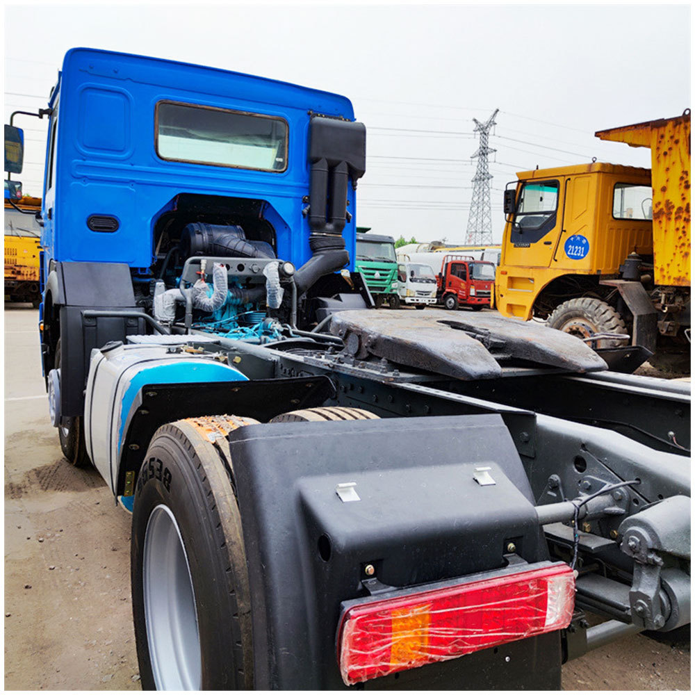 HOWO 336HP 4x2 tractor truck rear three quarter view with fifth wheel